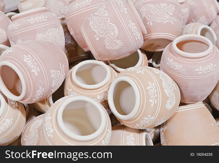 A pile of earthenware jars. A pile of earthenware jars.