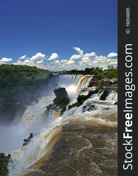 View of one of the waterfalls of the Iguazu River passing through Brazil. View of one of the waterfalls of the Iguazu River passing through Brazil.