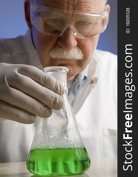 Chemist working with chemicals