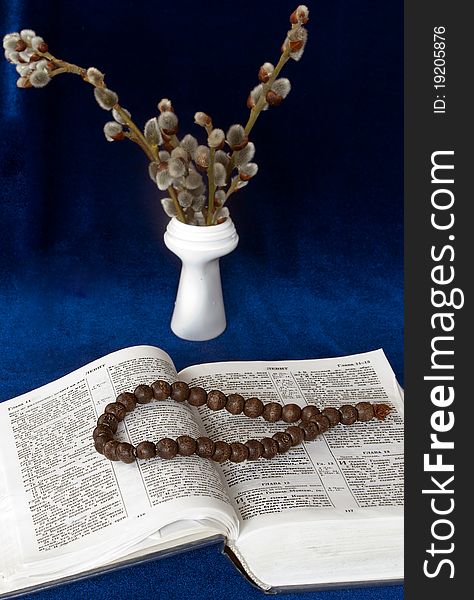 The bible, candle and branch willow. The bible, candle and branch willow