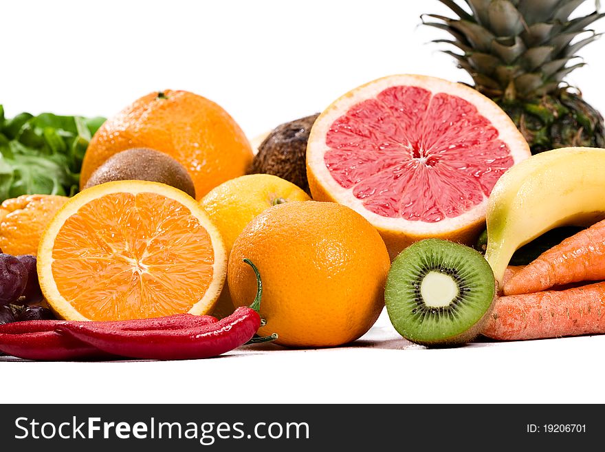 Full frame photograph of a broad variety of fruits and vegetables; colorful and plentiful