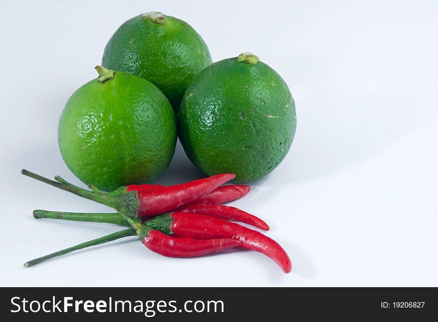 Chilli Padi (small Asian chilli) and Lime. Chilli Padi (small Asian chilli) and Lime