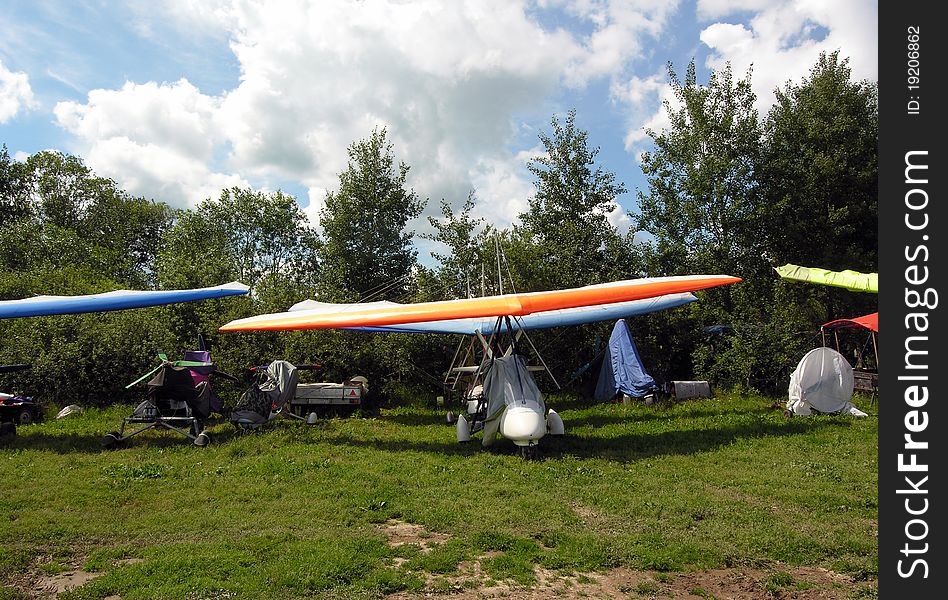Motor hang-glider is on the field. Motor hang-glider is on the field