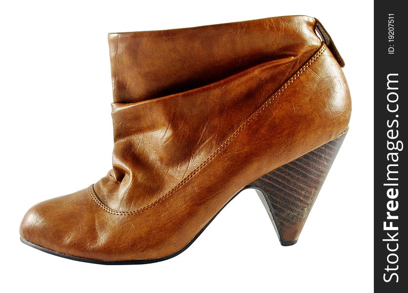 Female brown elegant boot on white. Female brown elegant boot on white