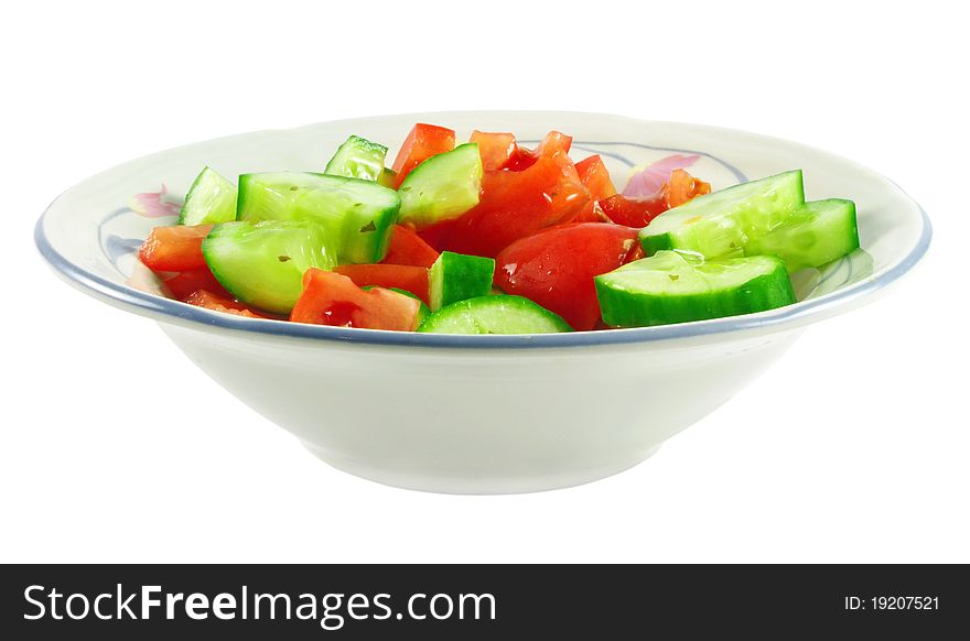 Closeup of fresh salad with dressing in bowl