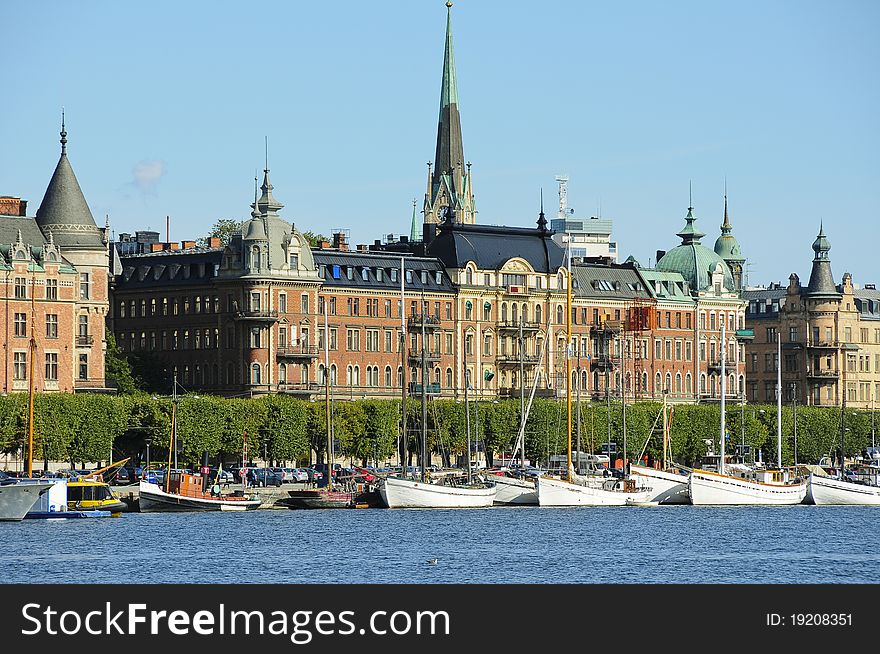 View of the sailing boata and historic buildings in Stockholm, Sweden. View of the sailing boata and historic buildings in Stockholm, Sweden