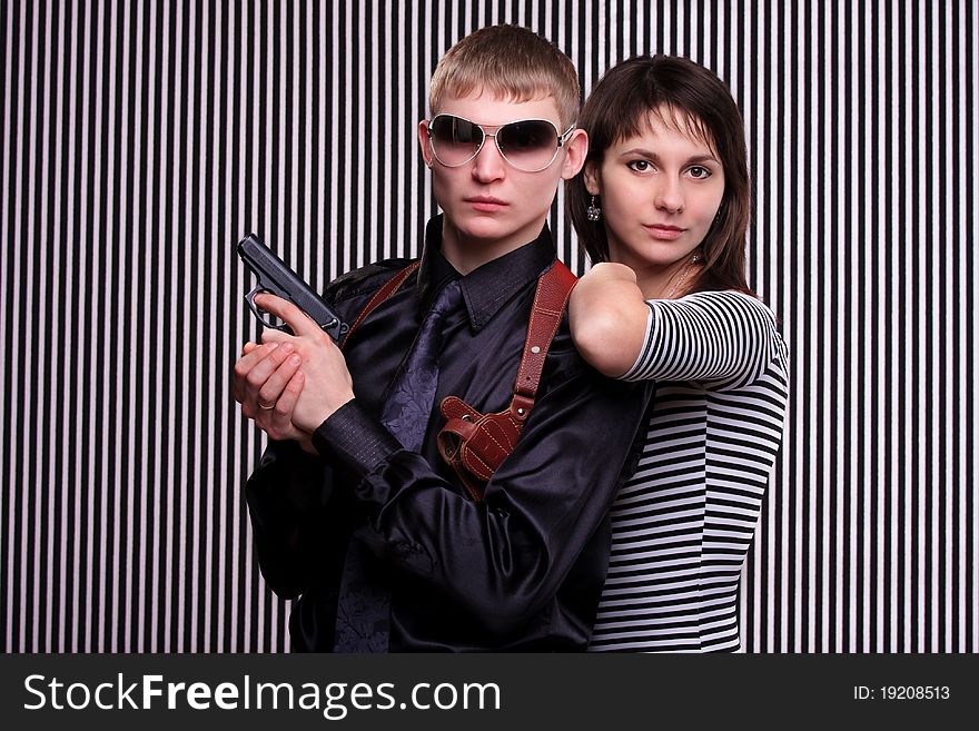 Young beautiful couple over stripe background. Young beautiful couple over stripe background