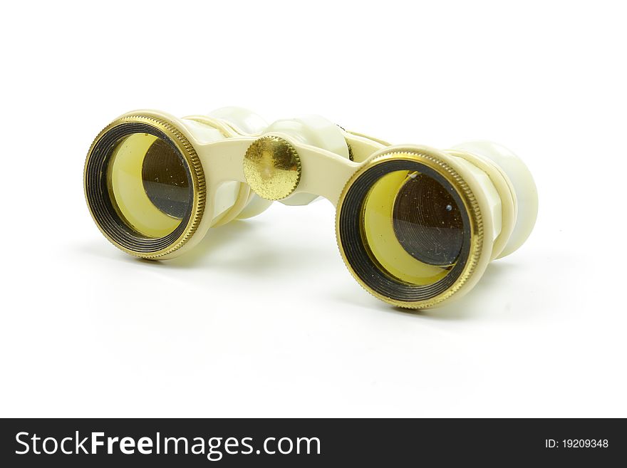 The old opera glasses on a white background