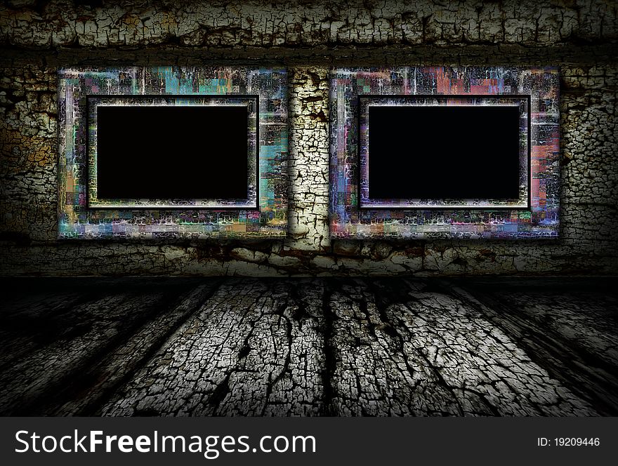 A dark, grunge textured wall and floor background with frames on the wall. A dark, grunge textured wall and floor background with frames on the wall