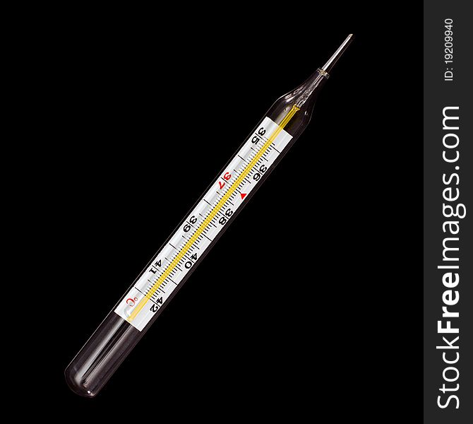 Medical glass thermometer isolated on black background. Medical glass thermometer isolated on black background