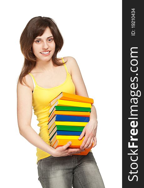 Young girl with books isolated in white. Young girl with books isolated in white