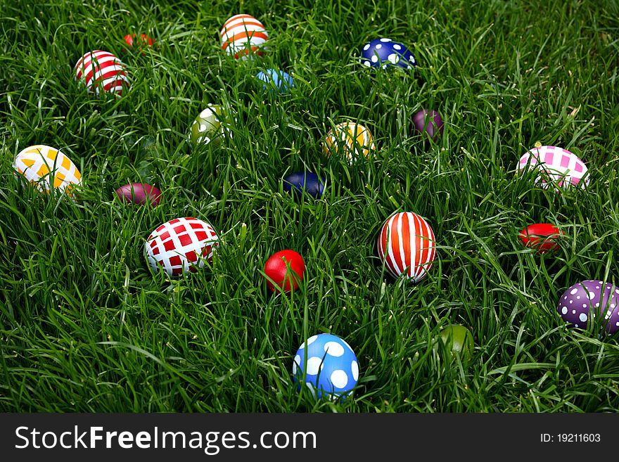 Hand-painted Easter eggs, hidden in the grass