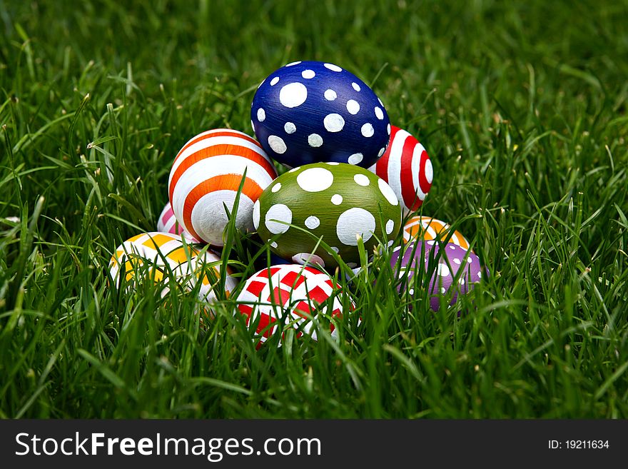 Hand-painted Easter eggs, hidden in the grass