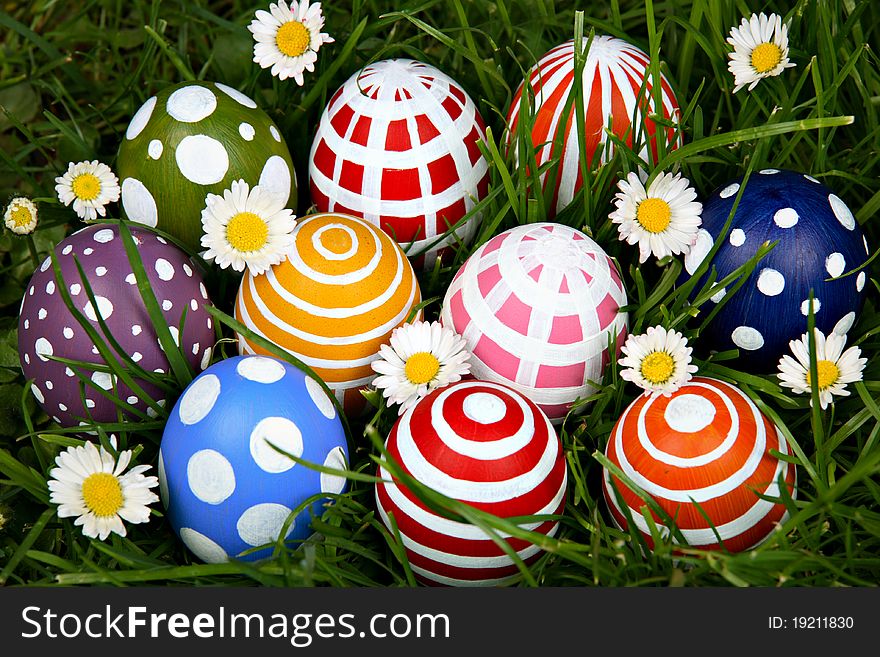 Hand-painted Easter eggs, hidden in the grass