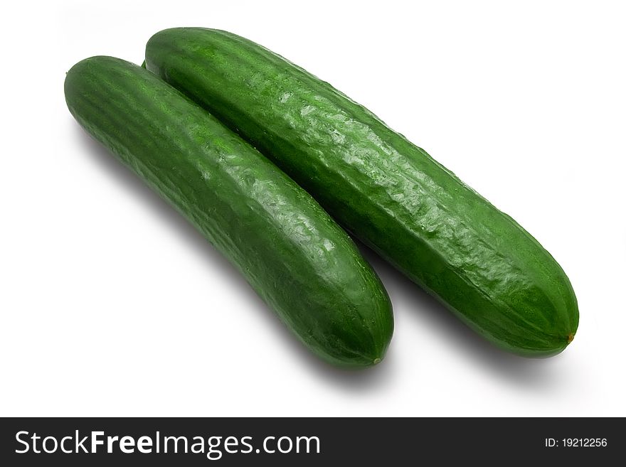 Two fresh cucumbers isolated on white background. Two fresh cucumbers isolated on white background