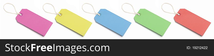 Five blank, coloured price or luggage tags. Isolated on white. Five blank, coloured price or luggage tags. Isolated on white.