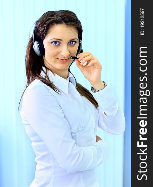 Beautiful business woman with headset. Call center. Customer support. Helpdesk.