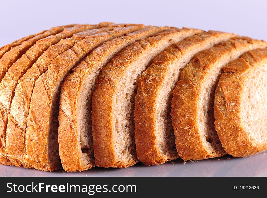 Loaf of sliced bread isolated on a white background