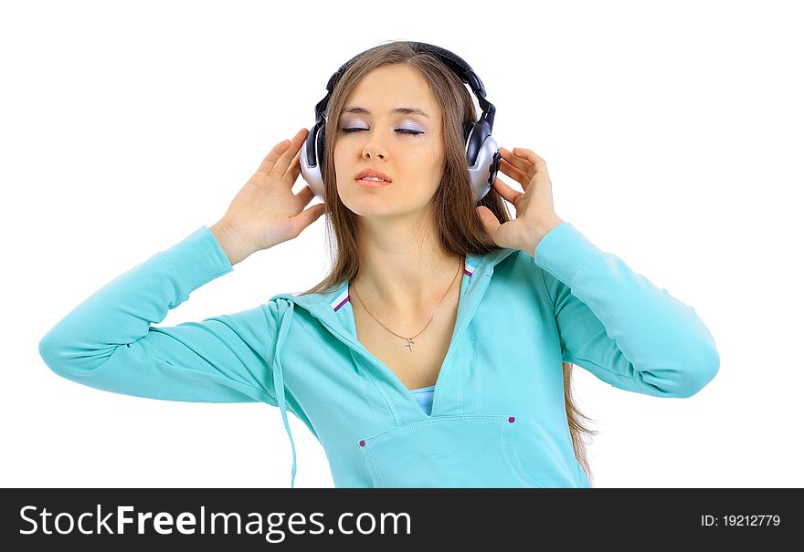 Beautiful women listening music in headphones