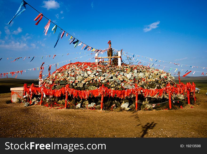 Worship area in Inner Mongolia with colourful flags.