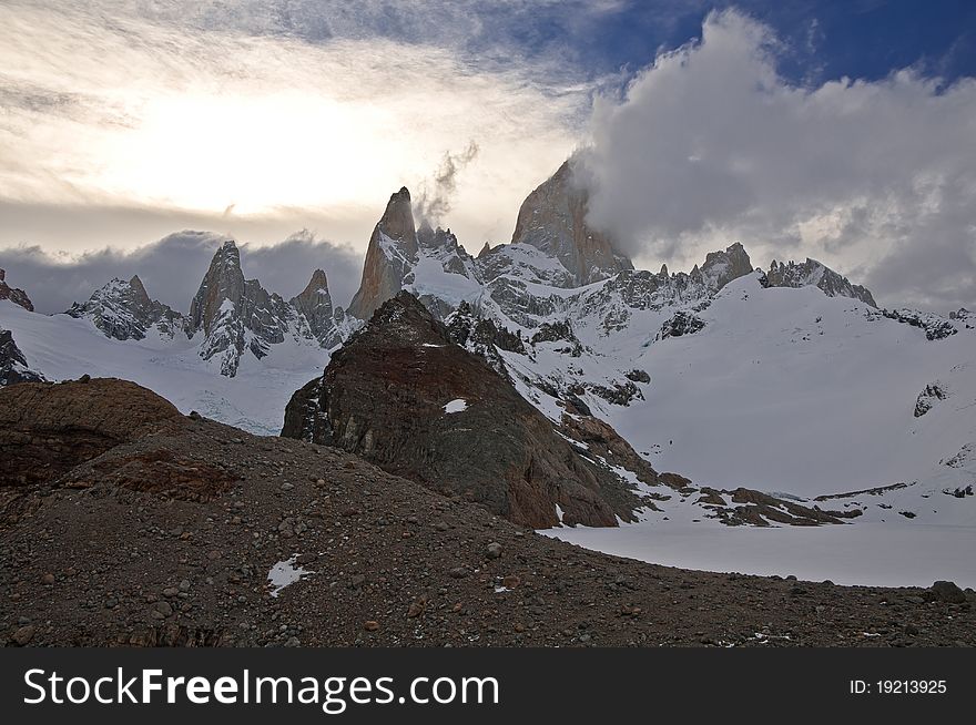 Monte Fitz Roy and frozen Lago de Los Tres just before sunset