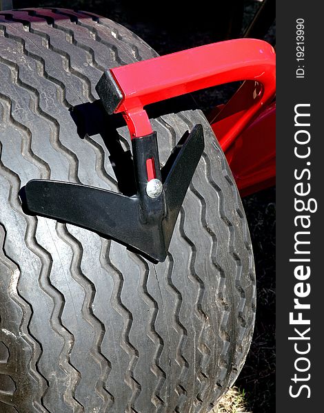 A new black tractor's tyres