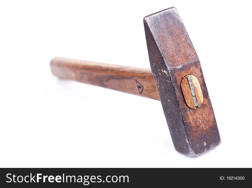 Hammer with a wooden handle on a white background