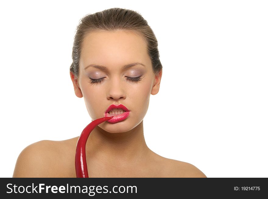 Sexy woman with red pepper