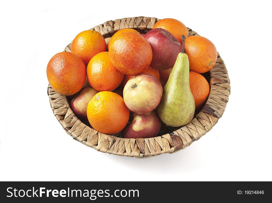 Fruits in a basket on white background