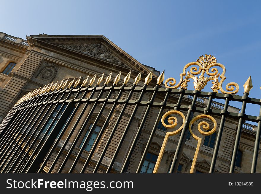 Fence with golden details in Paris, France. Fence with golden details in Paris, France