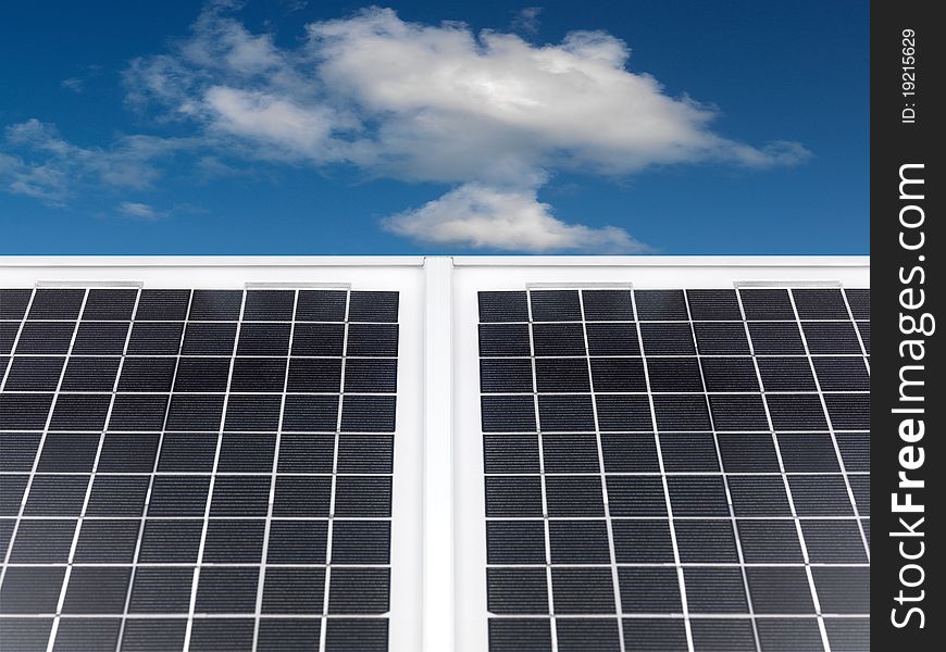 Solar panels set against a blue sky