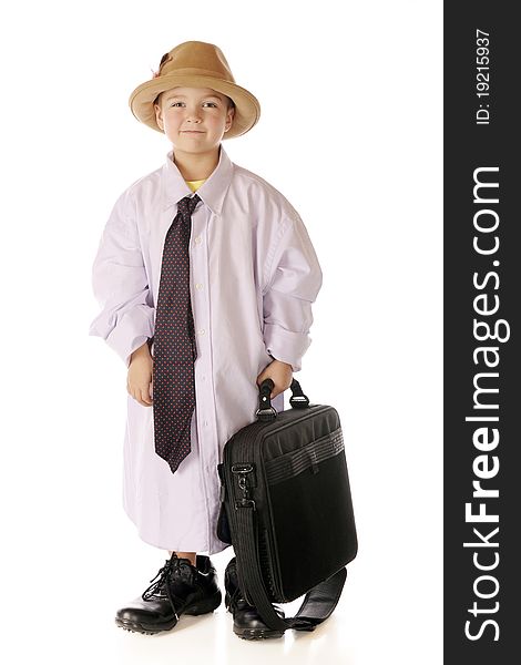 A happy kindergarten boy carrying a computer case in his grandpa's clothes. Isolated on white. A happy kindergarten boy carrying a computer case in his grandpa's clothes. Isolated on white.