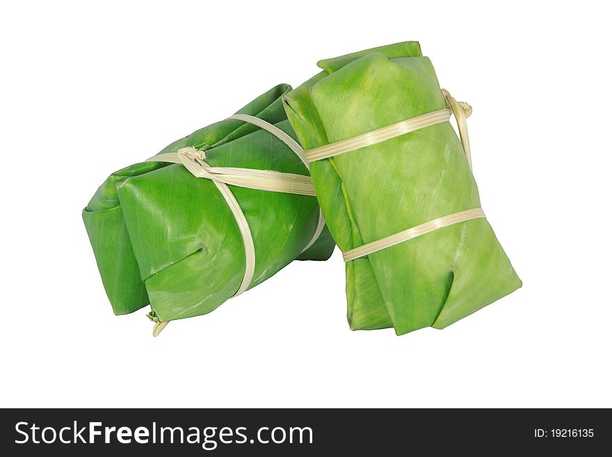 Thai style dessert, made from banana and glutinous rice, wrap with banana leaf