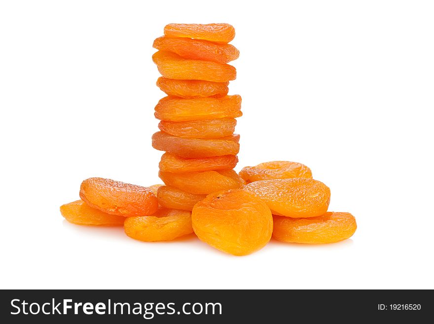 Pyramid of dried apricots. Isolated on white background.