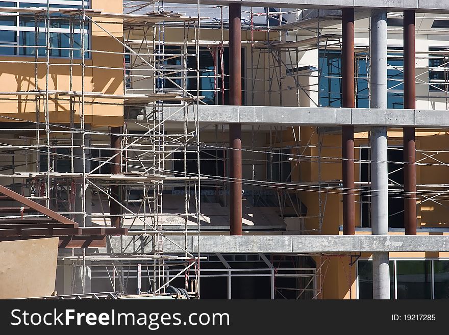 Building is partial complete with half the scaffolding remove. Building is partial complete with half the scaffolding remove.