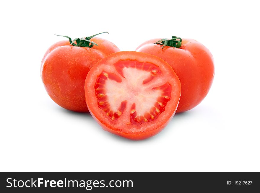 Close up shot of red tomatoes isolated on white background