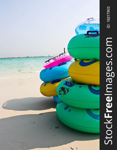 Colourful lifebuoy on the beach