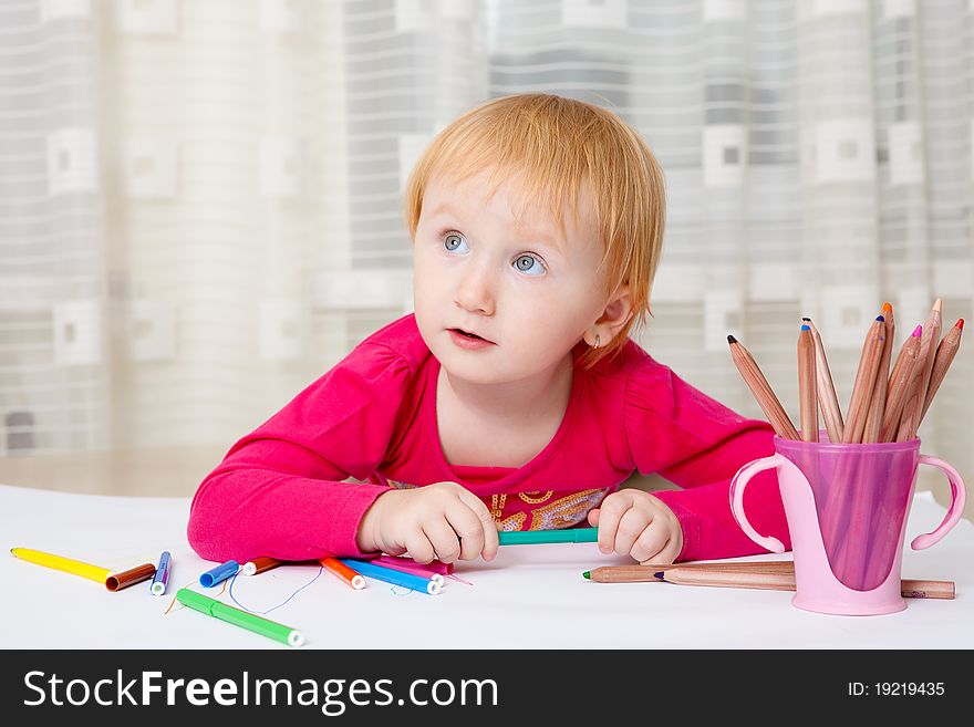 Kid drawing picture at home