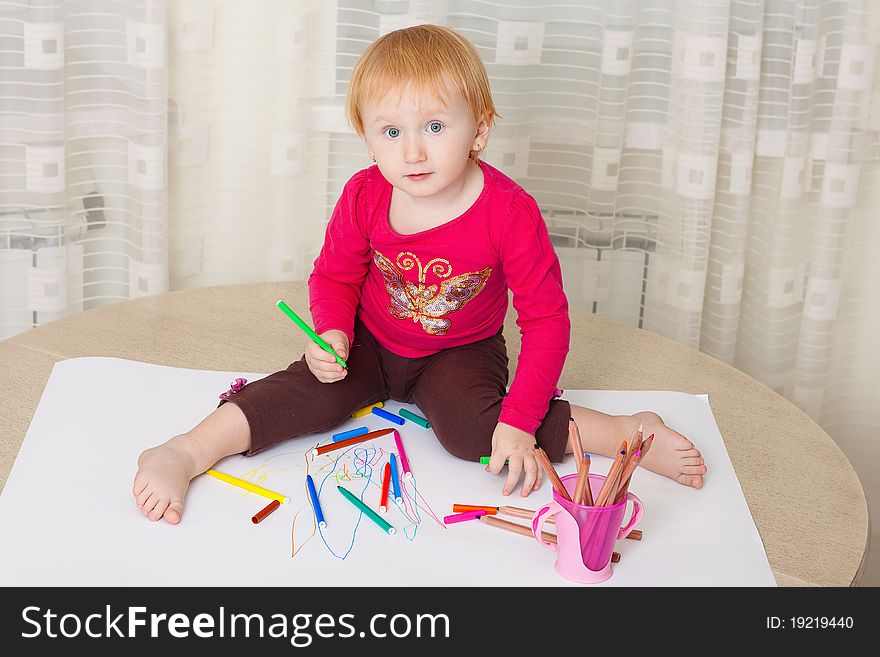 Kid drawing picture at home