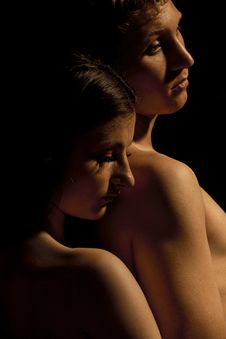 Young Couple - Dramatic Image, On Black Royalty Free Stock Photography