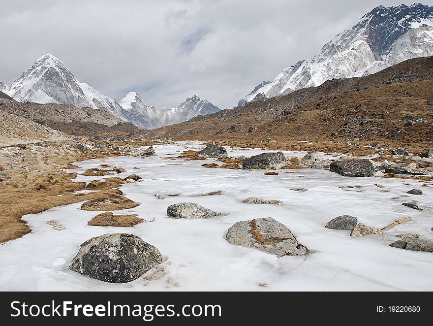 Ice remains on the grounds at high altitude in one of the mountain ranges in the Nepalese Himalayas