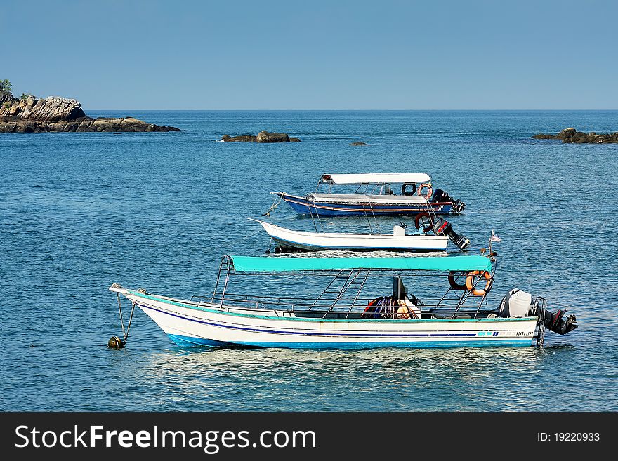 Boat on blue lagoon