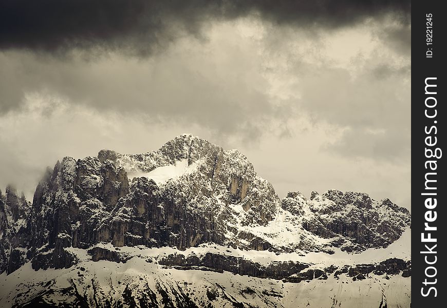 Mountain Range in South Tyrol with dramatic clouds