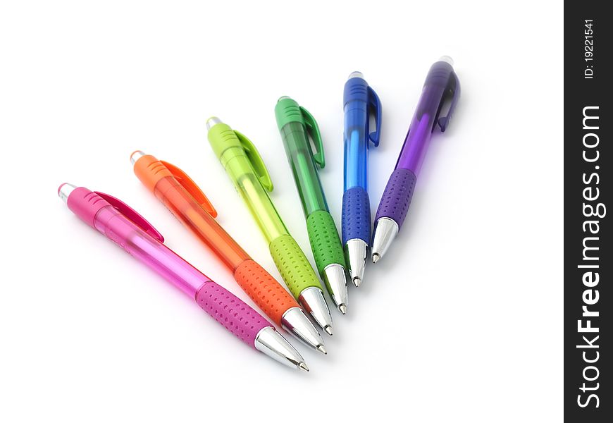 Colorful ballpoint pens background, isolated