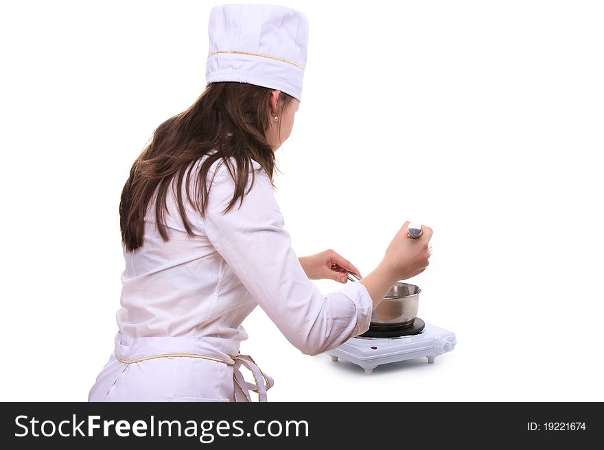 Beautiful young woman cooking isolated white background. Beautiful young woman cooking isolated white background