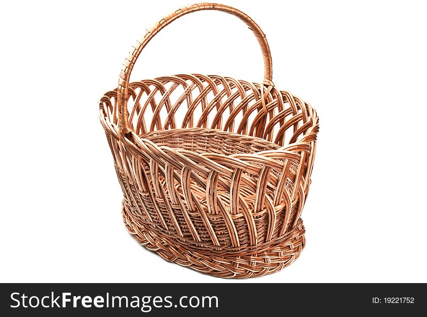 Wicker basket isolated on a white background