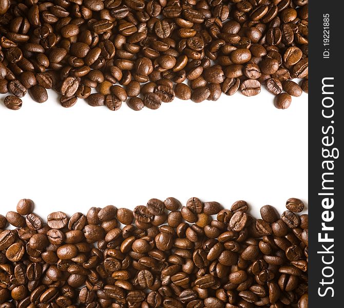 Coffee beans stripes isolated over white background with copyspace.