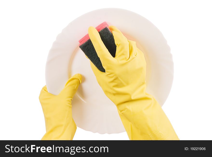 The Hand In A Glove Washes A Plate