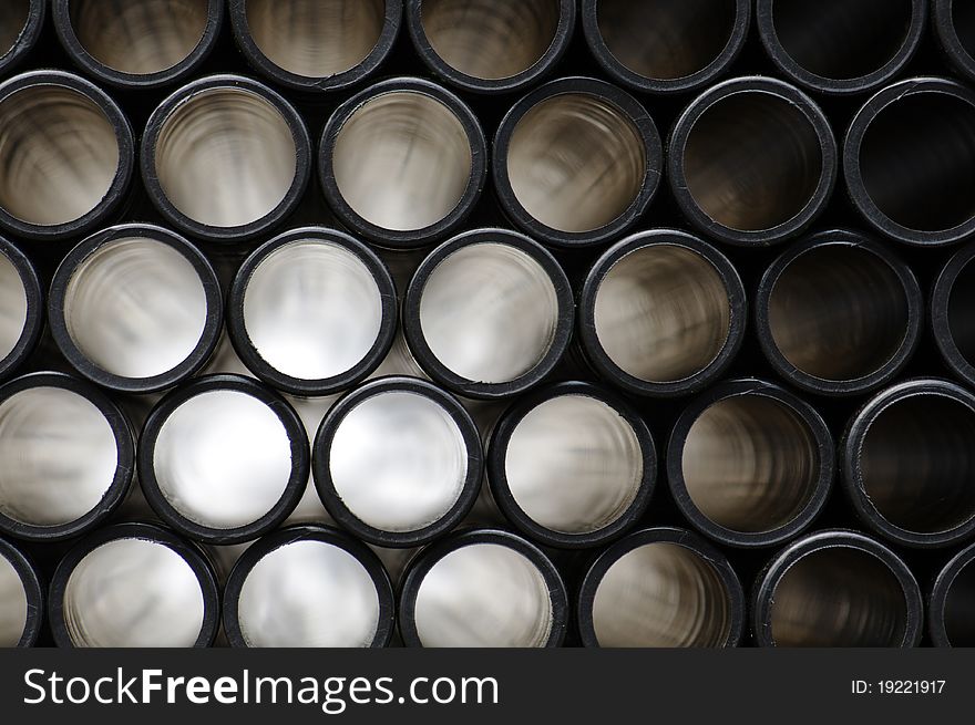 Rows of Pipes creating a Pattern, Stacked, Light Beam Radiation. Rows of Pipes creating a Pattern, Stacked, Light Beam Radiation