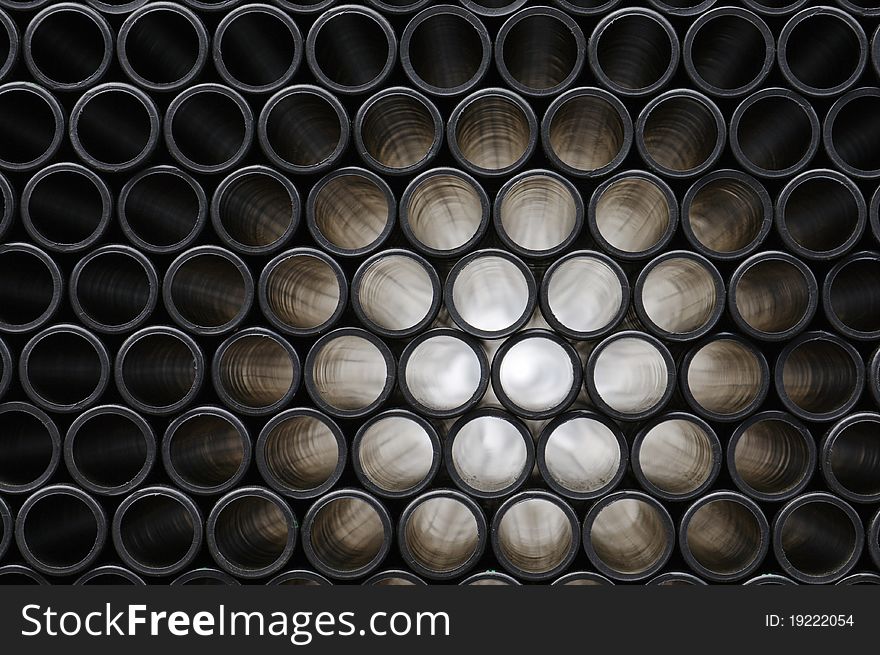 Rows of Pipes creating a Pattern, Stacked, Light Beam Radiation. Rows of Pipes creating a Pattern, Stacked, Light Beam Radiation
